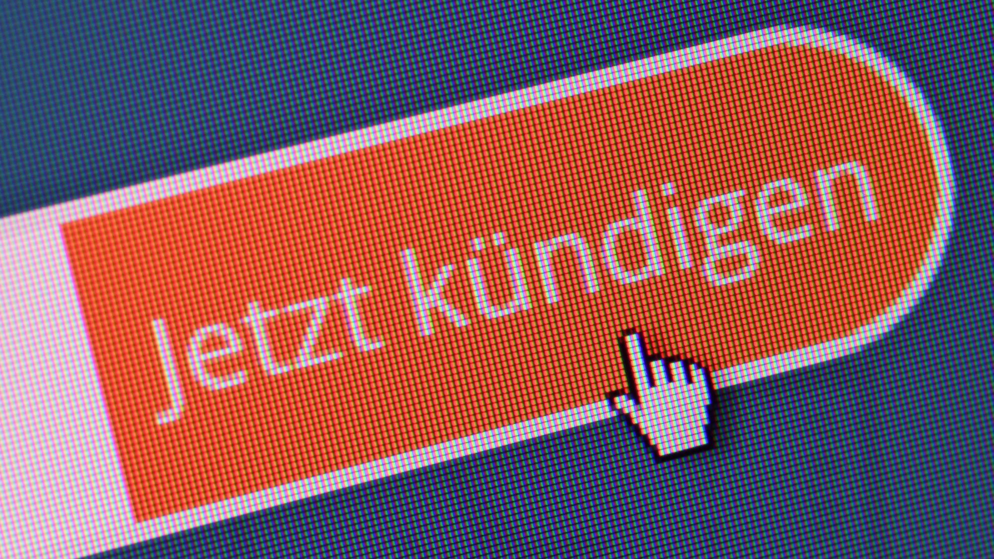 Eine Bildschirm-Cursor zeigt auf ein Feld mit der Aufschrift „Jetzt kündigen“.