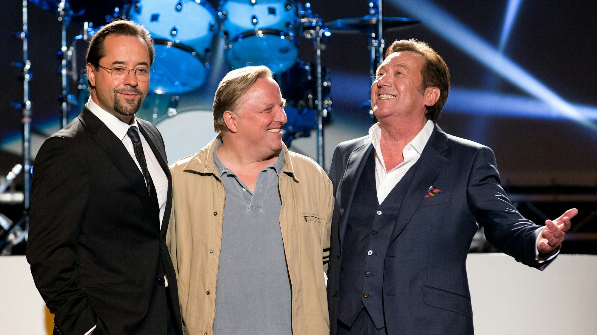 Jan Josef Liefers, Axel Prahl und Roland Kaiser auf der Bühne.