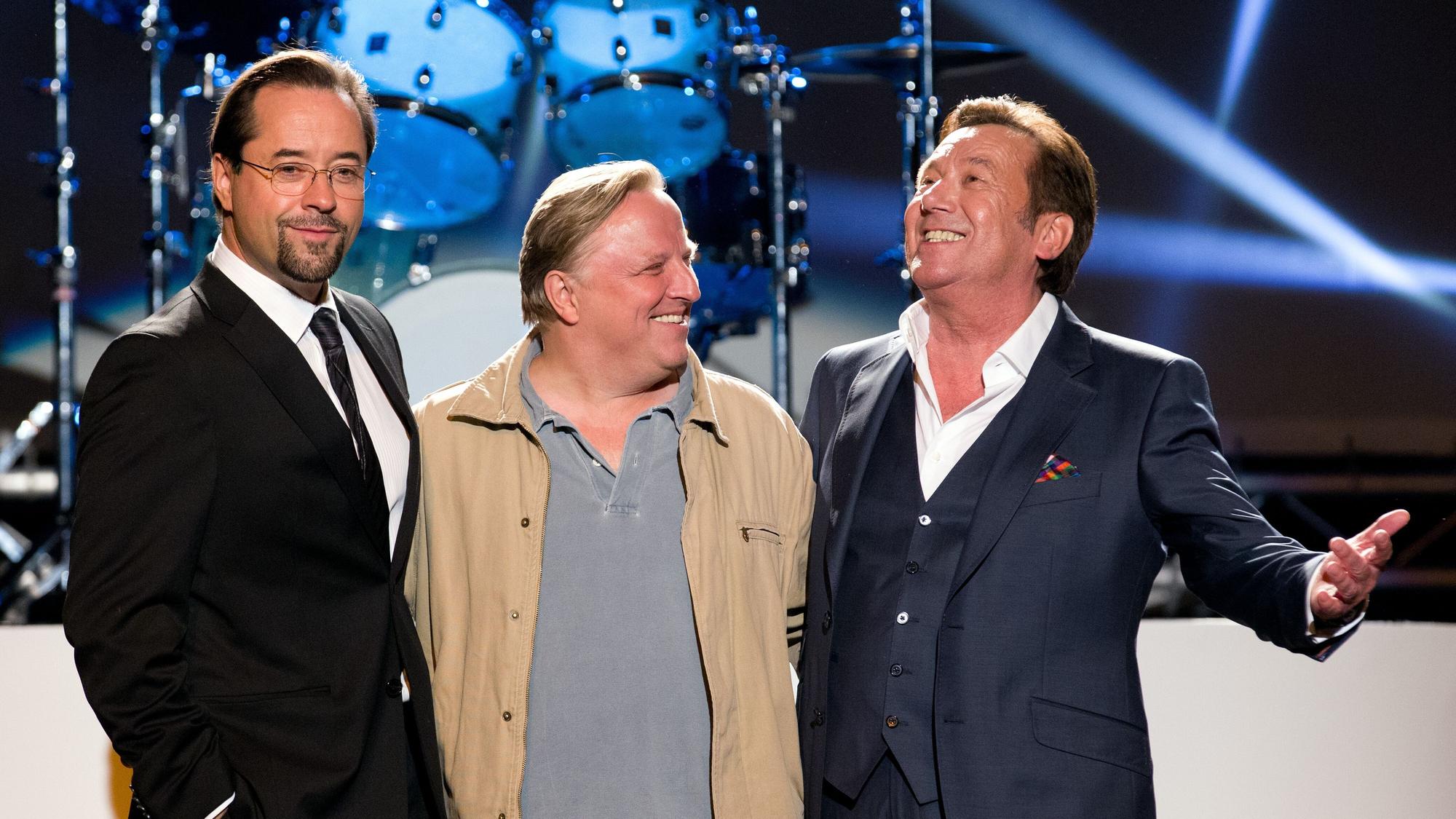 Jan Josef Liefers, Axel Prahl und Roland Kaiser auf der Bühne.