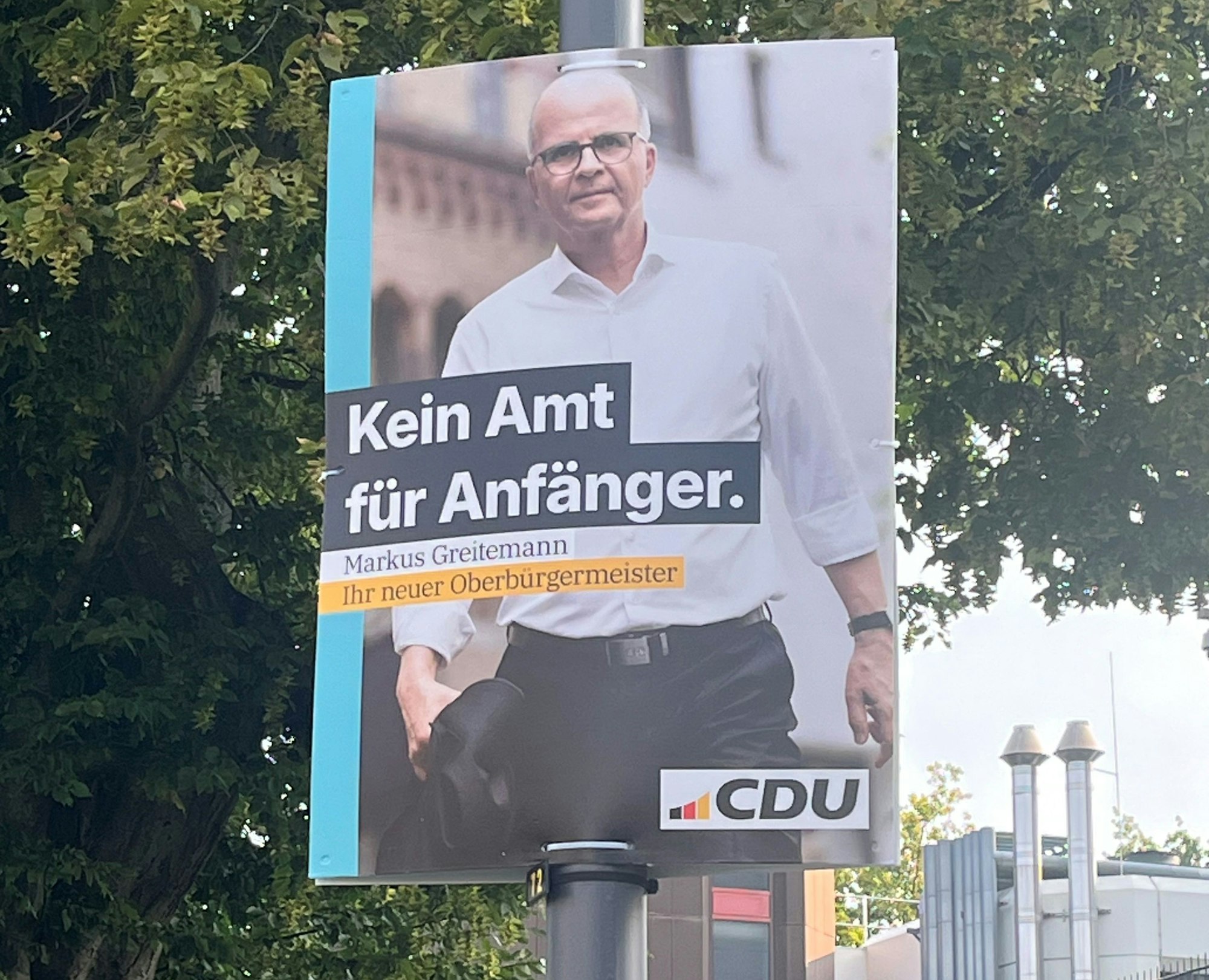 OB-Kandidat von der CDU auf einem Wahlplakat