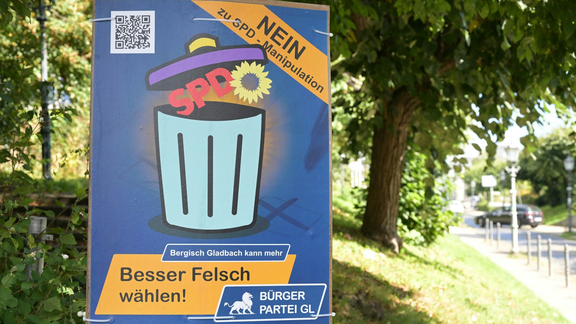 Mit diesem Wahlplakat wirbt die Bürgerpartei GL für Alexander Felsch, den Kandidaten von CDU und FDP.