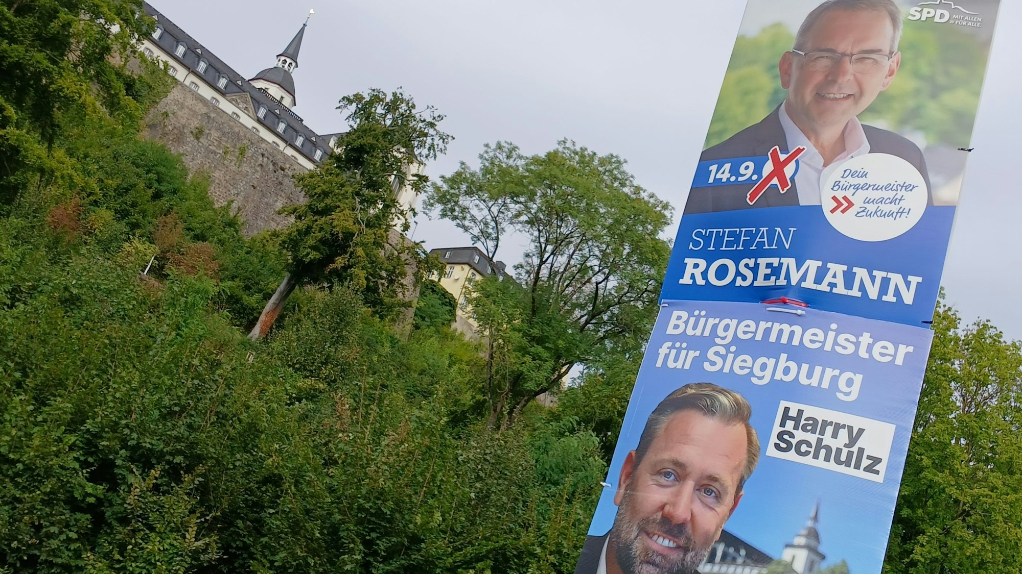 Stefan Rosemann (SPD) und Harry Schulz (CDU) gehen am 28. September in die Stichwahl um das Siegburger Bürgermeisteramt, Wahlplakate
