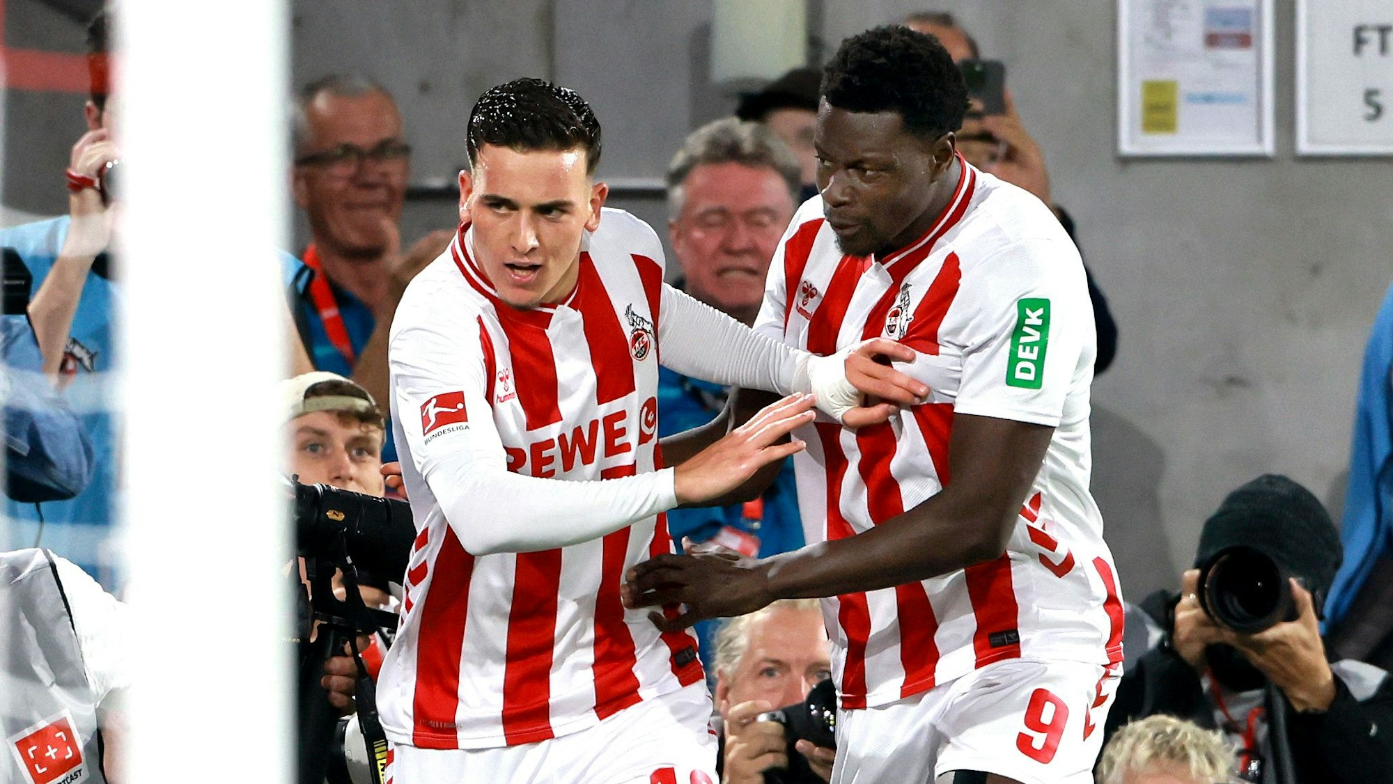 1. FC Köln vs. SC Freiburg, 2. Spieltag, 31.08.2025, 19.30 Uhr, von links: Said El Mala, Ragnar Ache (1. FC Köln), Bild: Herbert Bucco