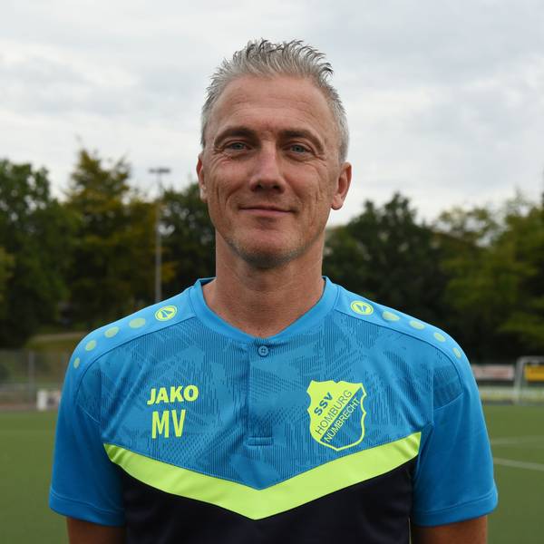 Marcus Voike lächelt in die Kamera.
