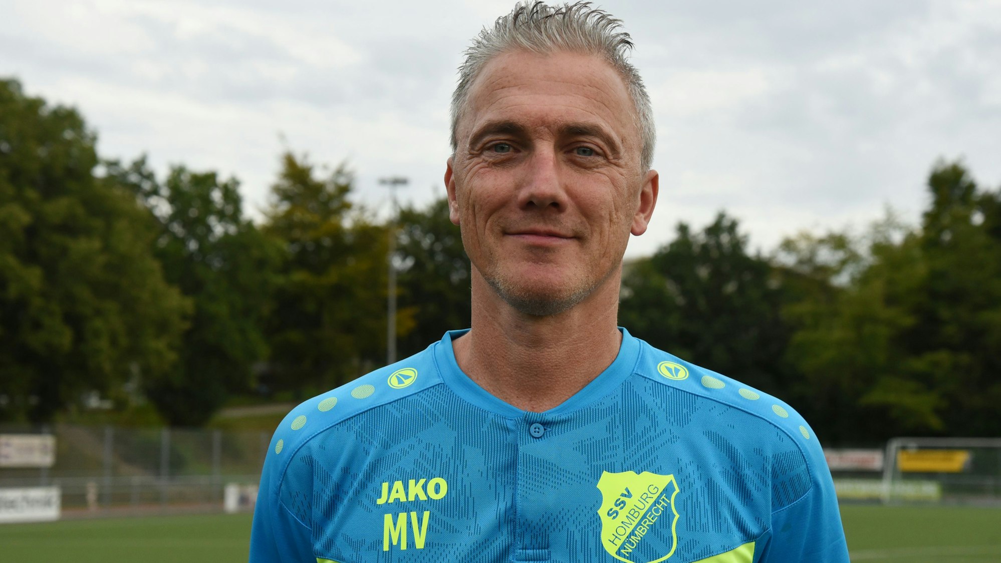 Marcus Voike lächelt in die Kamera.