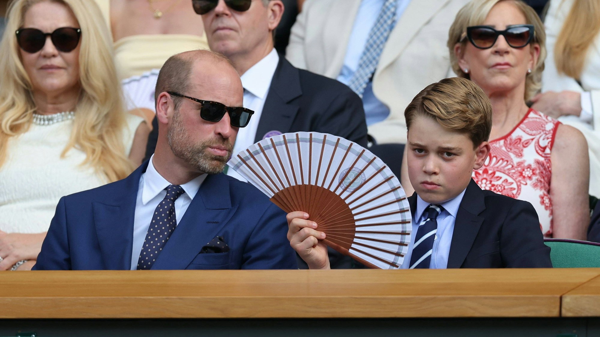 Prinz William mit seinem Prinz George bei einem Tennismatch in Wimbledon.