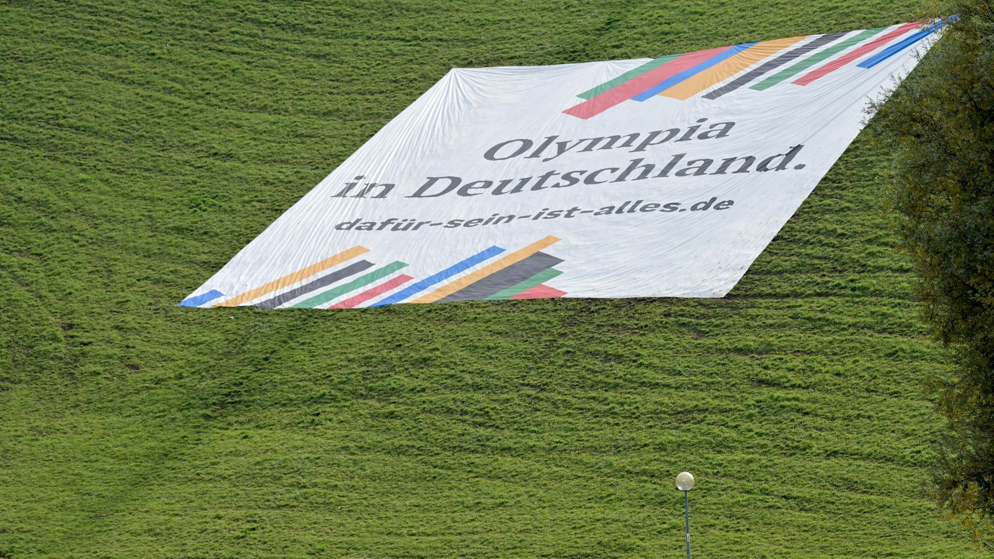 Mit dem Motto „Dafür sein ist alles“ will der DOSB für die Olympischen Spiele in Deutschland werben: Neben Rhein-Ruhr wollen auch Berlin, Hamburg und München Austragungsort sein.