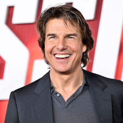 Tom Cruise lacht bei der Premiere von „Mission: Impossible - Dead Reckoning Part One“.