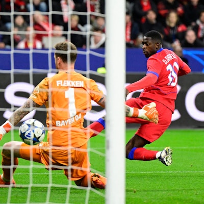 Paris Saint-Germain's French forward #10 Ousmane Dembele scores his team's sixth goal 2-6 during the UEFA Champions League football match between Bayer 04 Leverkusen and Paris Saint-Germain (PSG) at the BayArena stadium in Leverkusen, western Germany on October 21, 2025. (Photo by INA FASSBENDER / AFP)