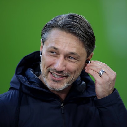 Fussball, Herren, Bundesliga, Saison 2025/2026, FC Bayern München - Borussia Dortmund, Allianz Arena Niko Kovac, Trainer Borussia Dortmund mit der Hand am Ohr, Kopf, Portrait DFB, DFL regulations prohibit any use of photographs as image sequences and/or quasi-video *** Football, Men, Bundesliga, Season 2025 2026, FC Bayern Munich Borussia Dortmund, Allianz Arena Niko Kovac, Coach Borussia Dortmund with his hand on his ear, Head, Portrait DFB, DFL regulations prohibit any use of photographs as image sequences and or quasi video