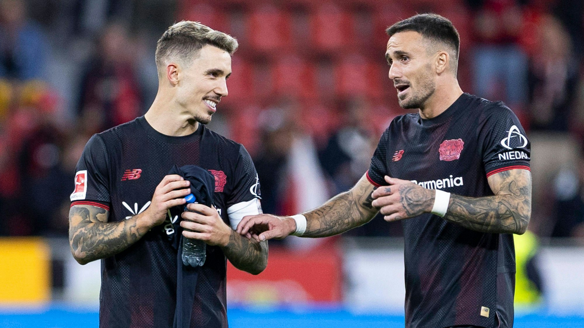 Bundesliga: Bayer 04 Leverkusen - Eintracht Frankfurt, 12.09.2025 Aleix Garcia Bayer 04 Leverkusen, 24, Alejandro Grimaldo Bayer 04 Leverkusen, 20. Bundesliga, Bayer 04 Leverkusen - Eintracht Frankfurt, 3. Spieltag, am 12.09.2025, BayArena, Leverkusen DFL regulations prohibit any use of photographs as image sequences and/or quasi-video *** Bundesliga Bayer 04 Leverkusen Eintracht Frankfurt, 12 09 2025 Aleix Garcia Bayer 04 Leverkusen, 24 , Alejandro Grimaldo Bayer 04 Leverkusen, 20 Bundesliga, Bayer 04 Leverkusen Eintracht Frankfurt, 3 Spieltag, am 12 09 2025, BayArena, Leverkusen DFL regulations prohibit any use of photographs as image sequences and or quasi video Copyright: xBEAUTIFULxSPORTS/Meuselx