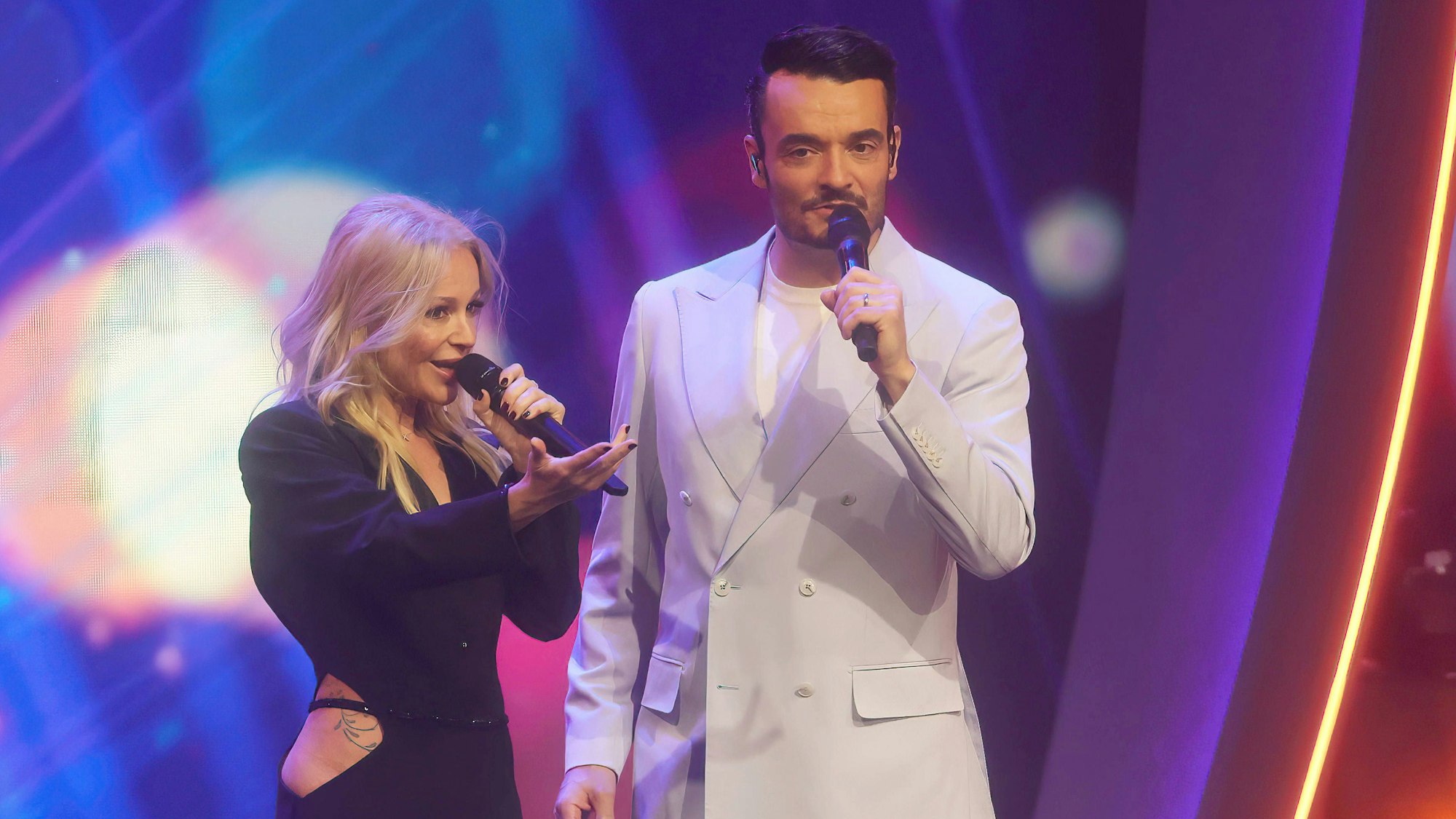 Michelle neben Giovanni Zarrella.