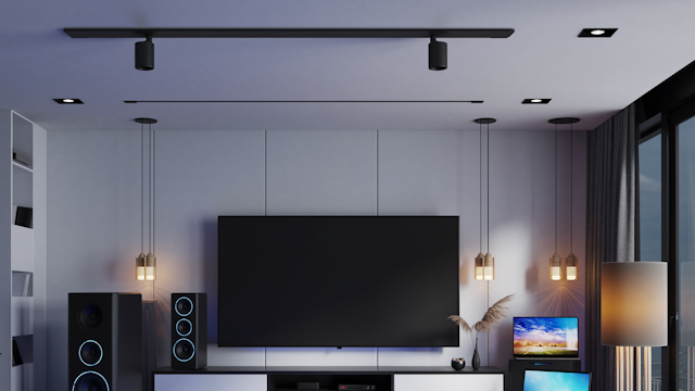 Wohnzimmer mit TV, Laptop, Lautsprecher und alle eingeschaltet.