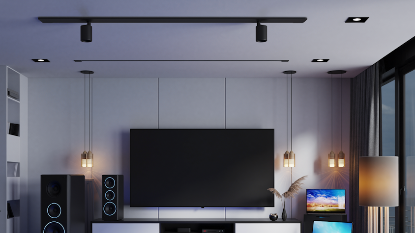 Wohnzimmer mit TV, Laptop, Lautsprecher und alle eingeschaltet.