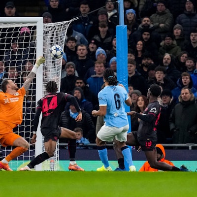MANCHESTER, ENGLAND - NOVEMBER 25: Bayer 04 Leverkusen goalkeeper Mark Flekken saves the scoring attempt of Nathan Ake of Manchester City during the UEFA Champions League 2025/26 League Phase MD5 match between Manchester City and Bayer 04 Leverkusen at City of Manchester Stadium on November 25, 2025 in Manchester, England. Photo by Rene Nijhuis/MB Media SPO PUBLICATIONxINxGERxSUIxAUTxONLY Copyright: xRenexNijhuis/MBxMediax