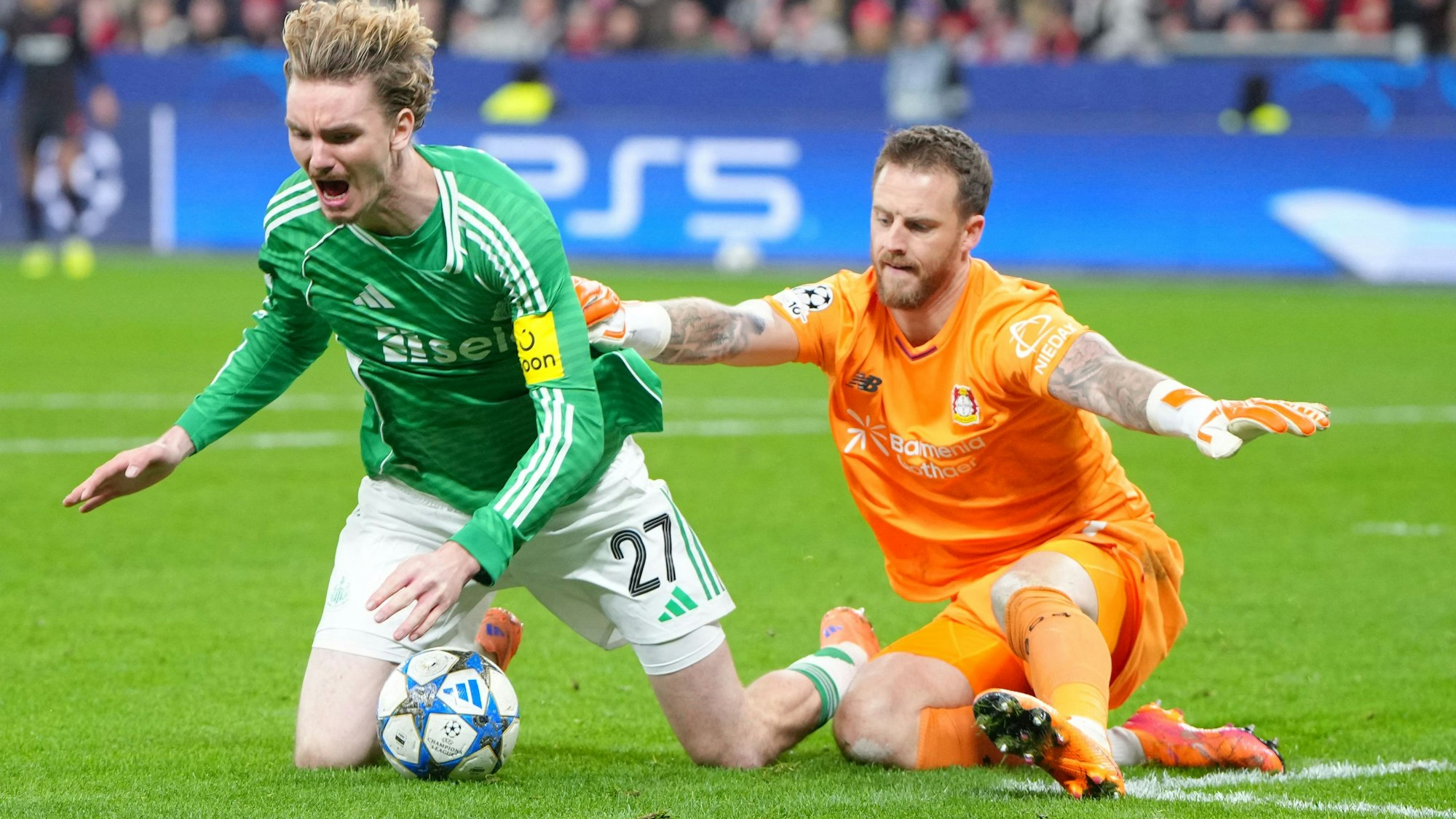 TOPSHOT - Bayer Leverkusen's Dutch goalkeeper #01 Mark Flekken concedes a penalty after fouling Newcastle United's German striker #27 Nick Woltemade (L) during the UEFA Champions League league phase - matchday 6, football match between Bayer Leverkusen and Newcastle United FC at the BayArena stadium in Leverkusen, western Germany on December 10, 2025. (Photo by Pau Barrena / AFP)
