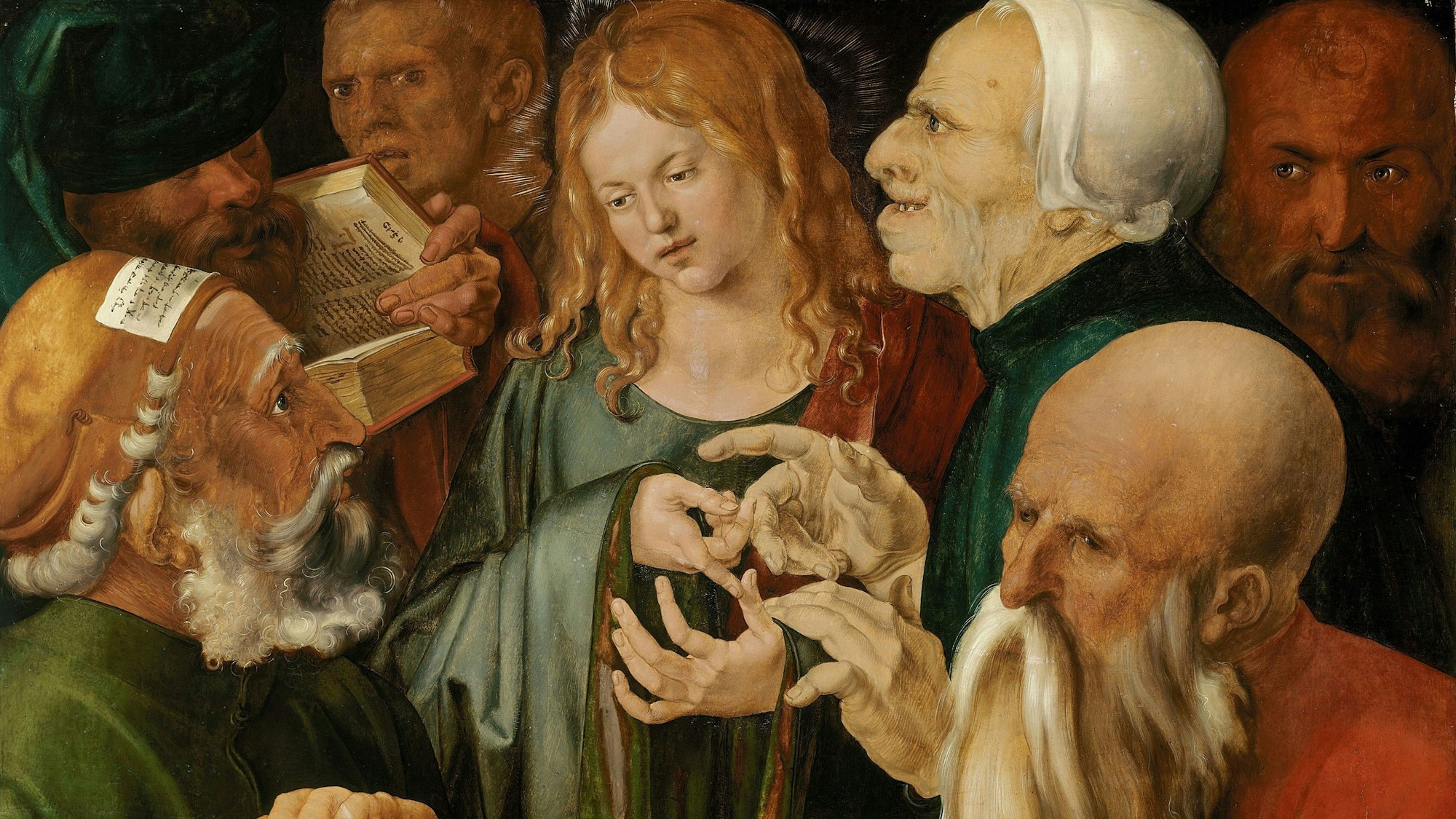 Ein Jugendlicher diskutiert mit alten Männern.