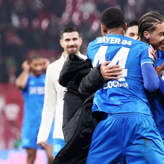 RB Leipzig - Leverkusen / Bundesliga Leipzig, 20.12.2025, Red Bull Arena, Fußball, 1.Bundesliga, 15.Spieltag , RB Leipzig vs. Bayer Leverkusen 1:3 1:2 , Im Bild: Leverkusen jubeltr nach dem Spiel. Jeanuel Belocian 44, Leverkusen, Motrell Amare Culbreath 42, Leverkusen. , Nur zur redaktionellen Nutzung. Only editorial use. , DFL / DFB regulations prohibit any use of photographs as image sequences and/or quasi-video. , *** RB Leipzig Leverkusen Bundesliga Leipzig, 20 12 2025, Red Bull Arena, Soccer, 1 Bundesliga, 15 Matchday , RB Leipzig vs Bayer Leverkusen 1 3 1 2 , In the picture Leverkusen jubeltr after the match Jeanuel Belocian 44, Leverkusen , Motrell Amare Culbreath 42, Leverkusen , For editorial use only Only editorial use , DFL DFB regulations prohibit any use of photographs as image sequences and or quasi video ,