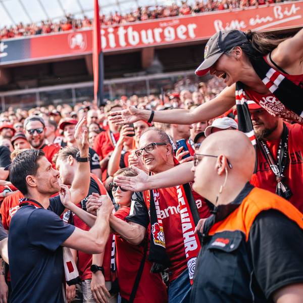LEVERKUSEN, GERMANY - MAY 11: Xabi Alonso, Head Coach of Bayer 04 Leverkusen greets fans after the Bundesliga match between Bayer 04 Leverkusen and Borussia Dortmund at BayArena on May 11, 2025 in Leverkusen, Germany.