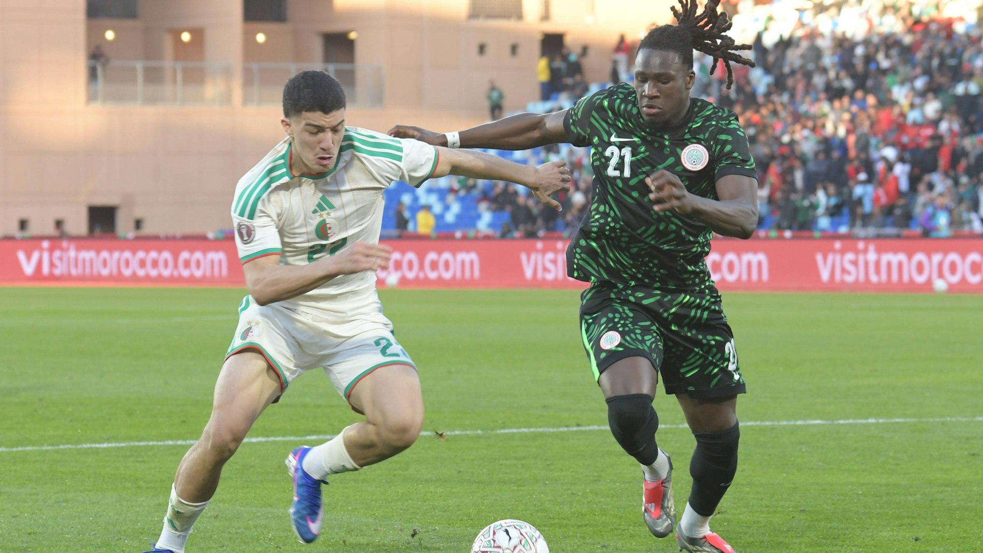 260111 -- MARRAKECH, Jan. 11, 2026 -- Algeria s Ibrahim maza L vies against Nigeria s Calvin Bassey during the Africa Cup of Nations quarterfinal match between Nigeria and Algeria in Marrakech, Morocco, Jan. 10, 2026. Photo by /Xinhua SPMOROCCO-MARRAKECH-FOOTBALL-AFRICA CUP OF NATIONS-NIGERIA VS ALGERIA Aissa PUBLICATIONxNOTxINxCHN