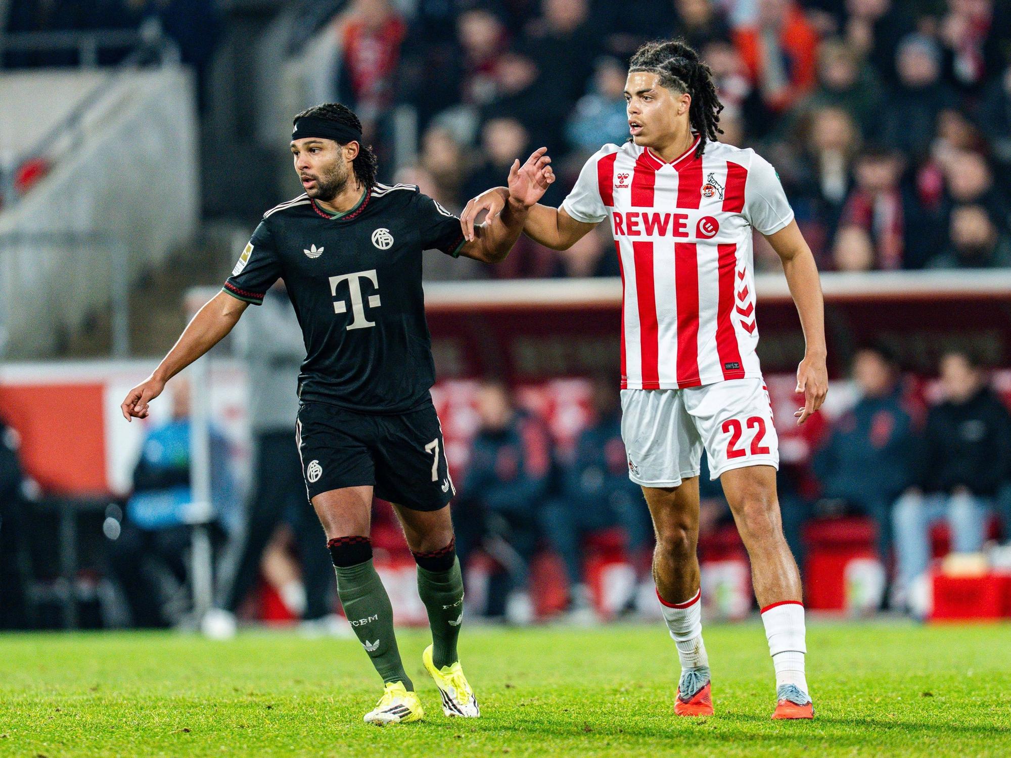 Jahmai Simpson-Pusey neben Serge Gnabry.