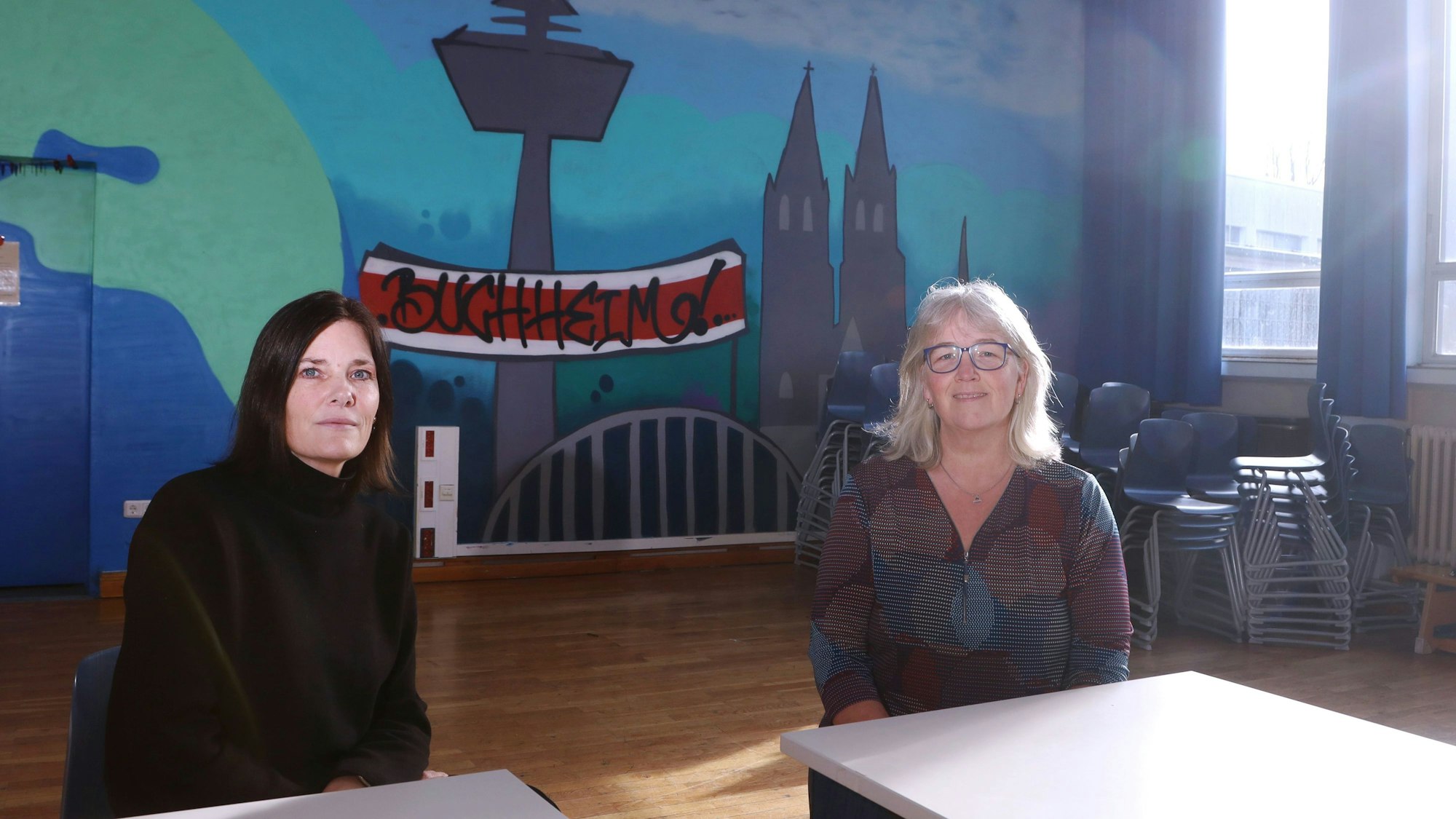 13.01.2026, Köln: Die Schulleiterinen der Nelson-Mandela-Schule in Buchheim, Andrea Badjie (schwarzes Oberteil) und ihrer Stellvertreterin Anja Dinslaken. Sie sprechen im Interview über benachteiligte Stadtteile. Foto: Arton Krasniqi