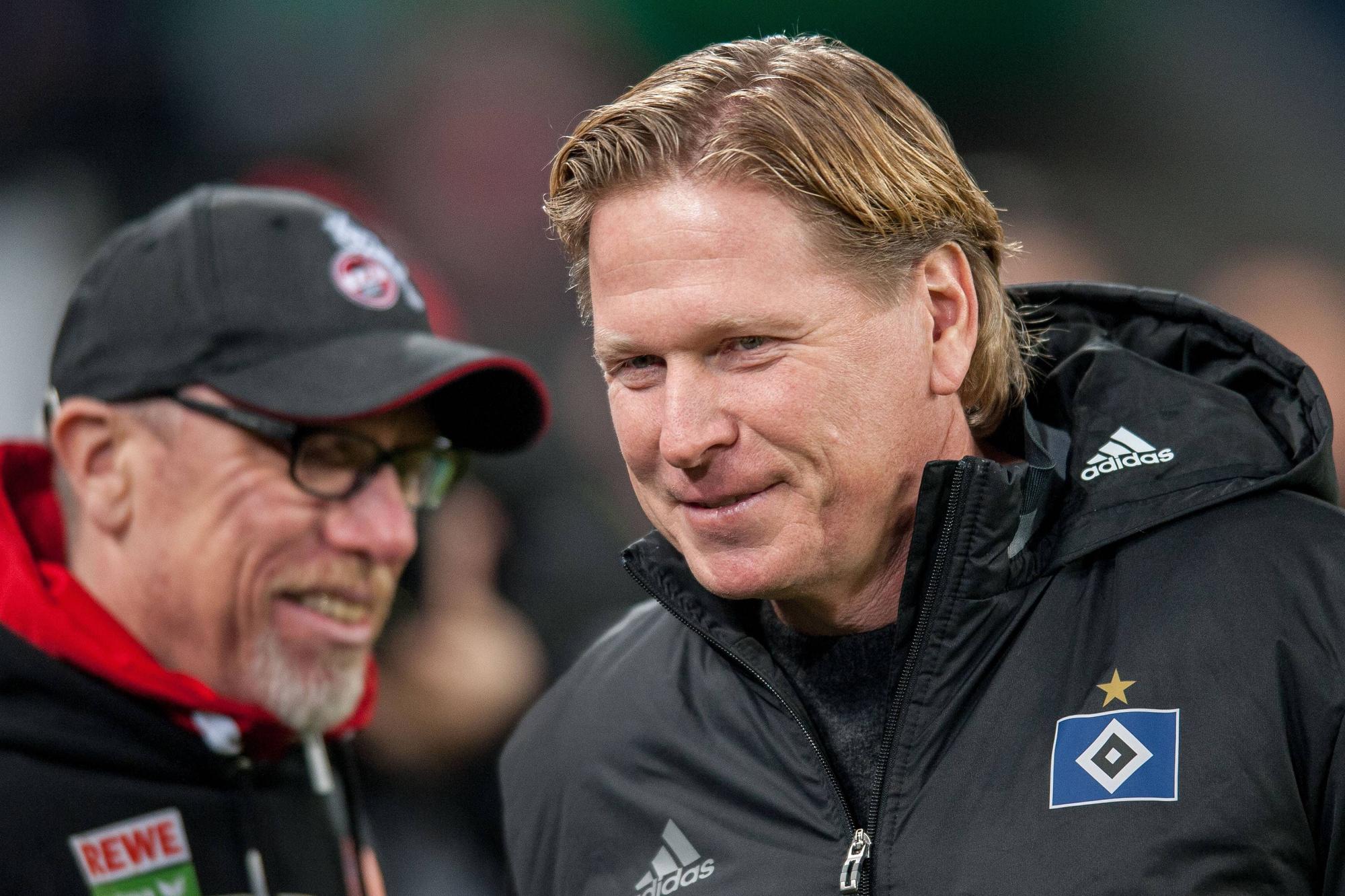 Fußball-Trainer Markus Gisdol (r.)