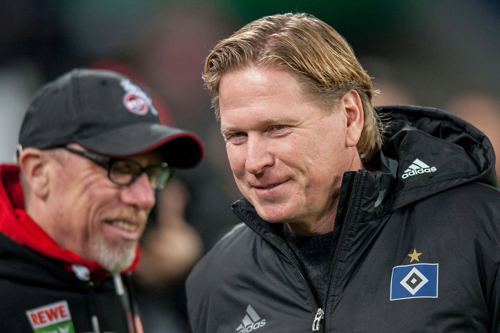 Fußball-Trainer Markus Gisdol (r.)