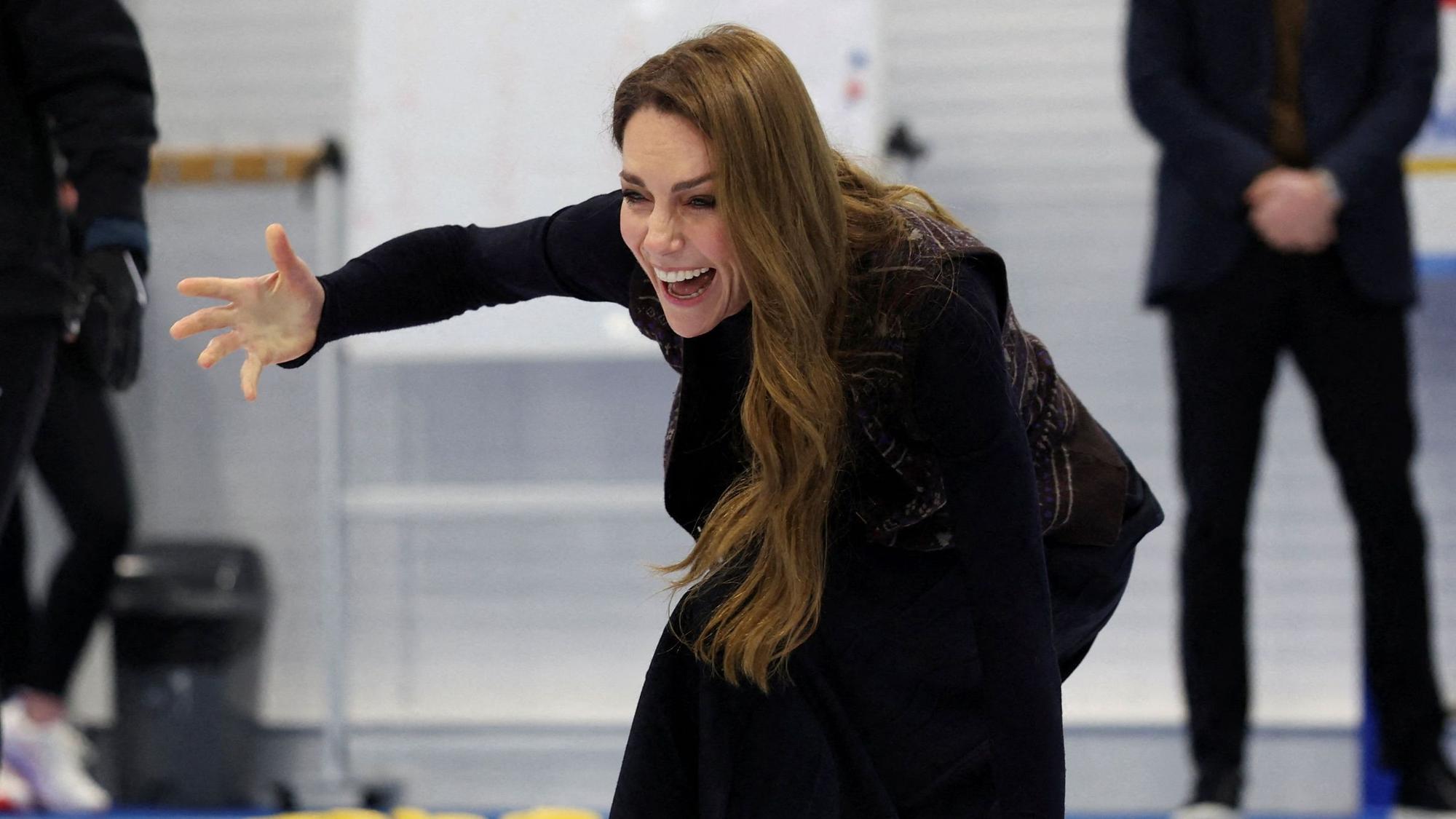 Britain's Catherine, Princess of Wales takes part in curling during a visit to meet with the Team GB and Paralympics GB Curling teams, ahead of the Winter Olympic Games, at the National Curling Academy in Stirling, in Scotland on January 20, 2026. (Photo by Russell Cheyne / POOL / AFP)