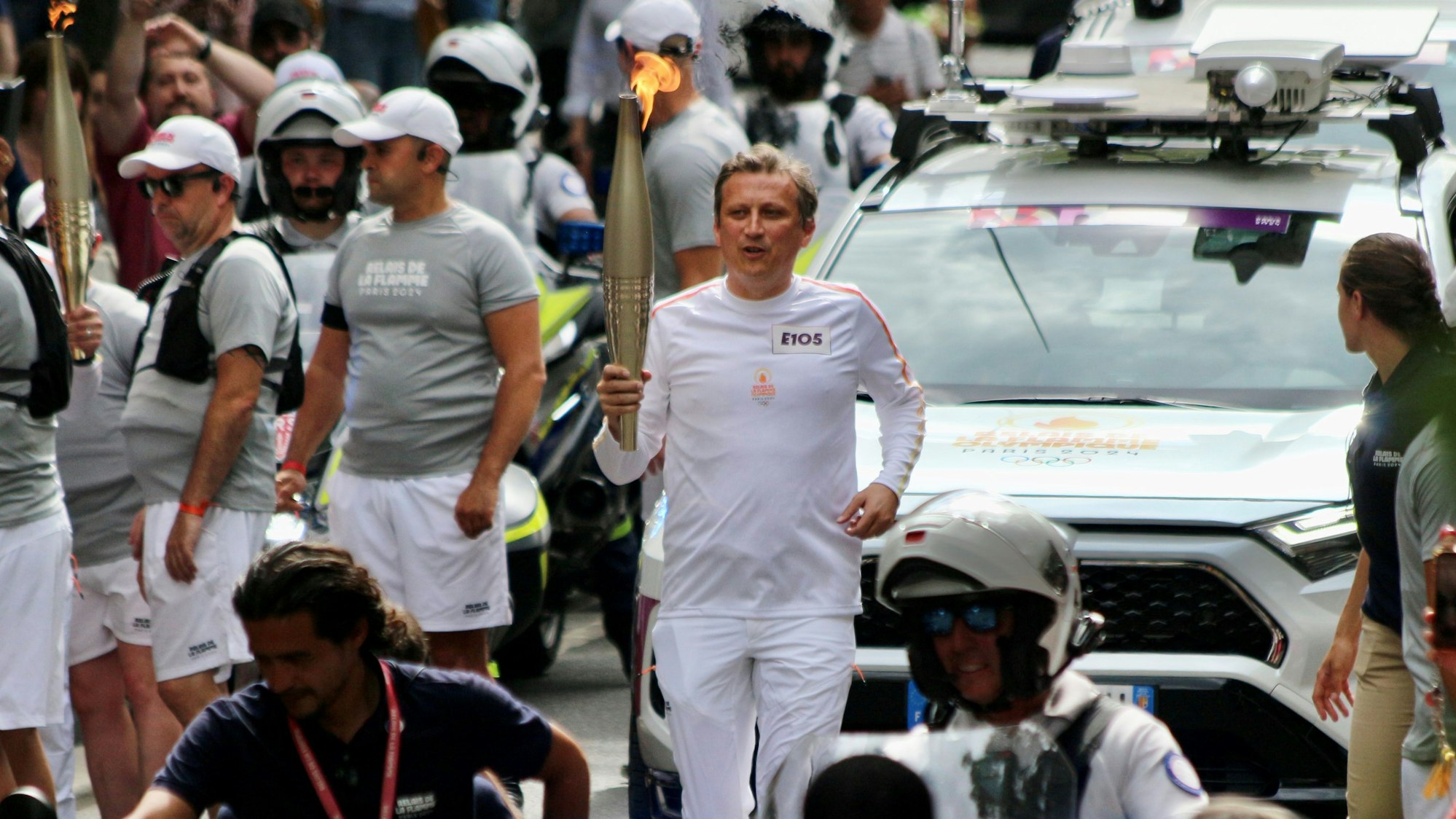 Rewe-Group-CEO Lionel Souque durfte bei den Olympischen Spielen in seiner Heimatstadt Paris das Olympische Feuer tragen.
