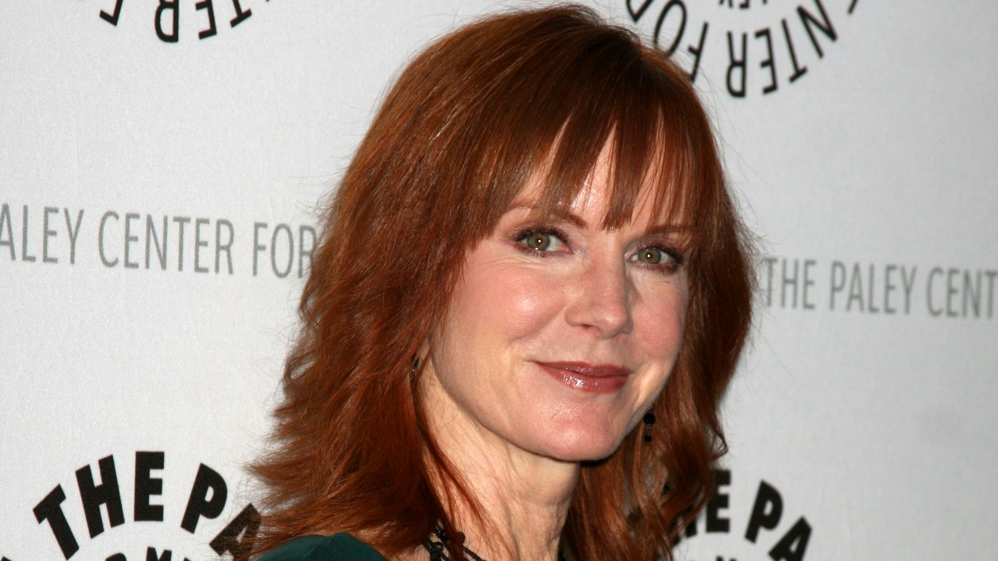 Jamie Rose lächelt in die Kamera.