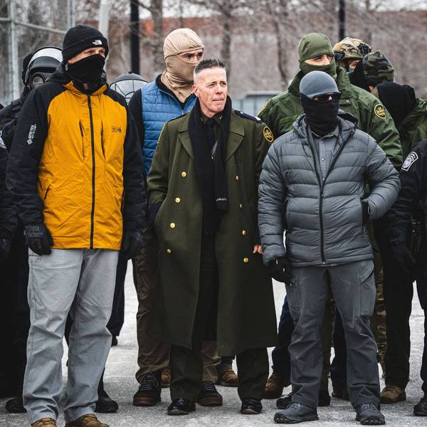 January 15, 2026, Minneapolis, Minnesota, USA: Border Chief GREGORY BOVINO observes a protest as community members gather at the entrance of the Whipple Building in Minneapolis to rally in solidarity with their neighbors whom are being detained by U.S. ICE Immigration and Customs Enforcement agents Minneapolis USA.