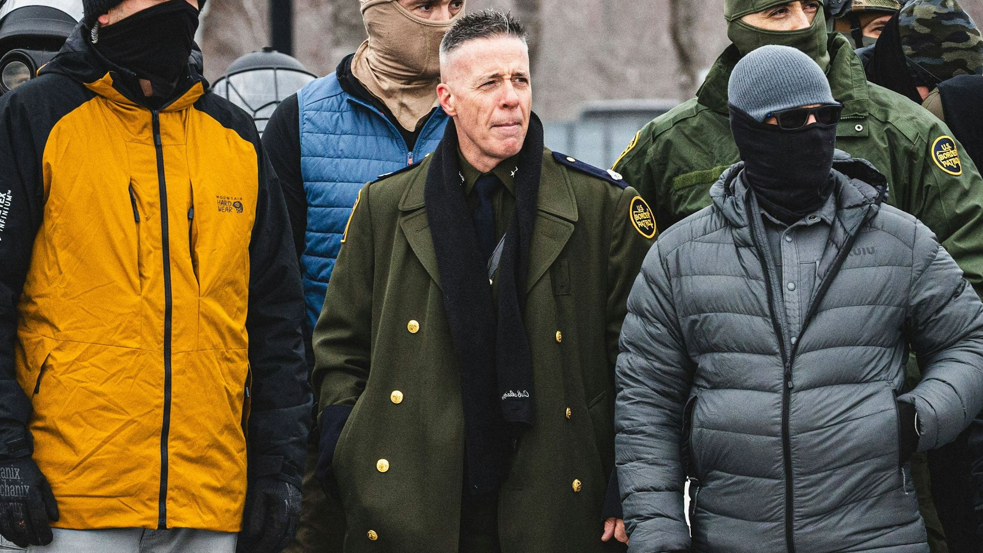 January 15, 2026, Minneapolis, Minnesota, USA: Border Chief GREGORY BOVINO observes a protest as community members gather at the entrance of the Whipple Building in Minneapolis to rally in solidarity with their neighbors whom are being detained by U.S. ICE Immigration and Customs Enforcement agents Minneapolis USA.