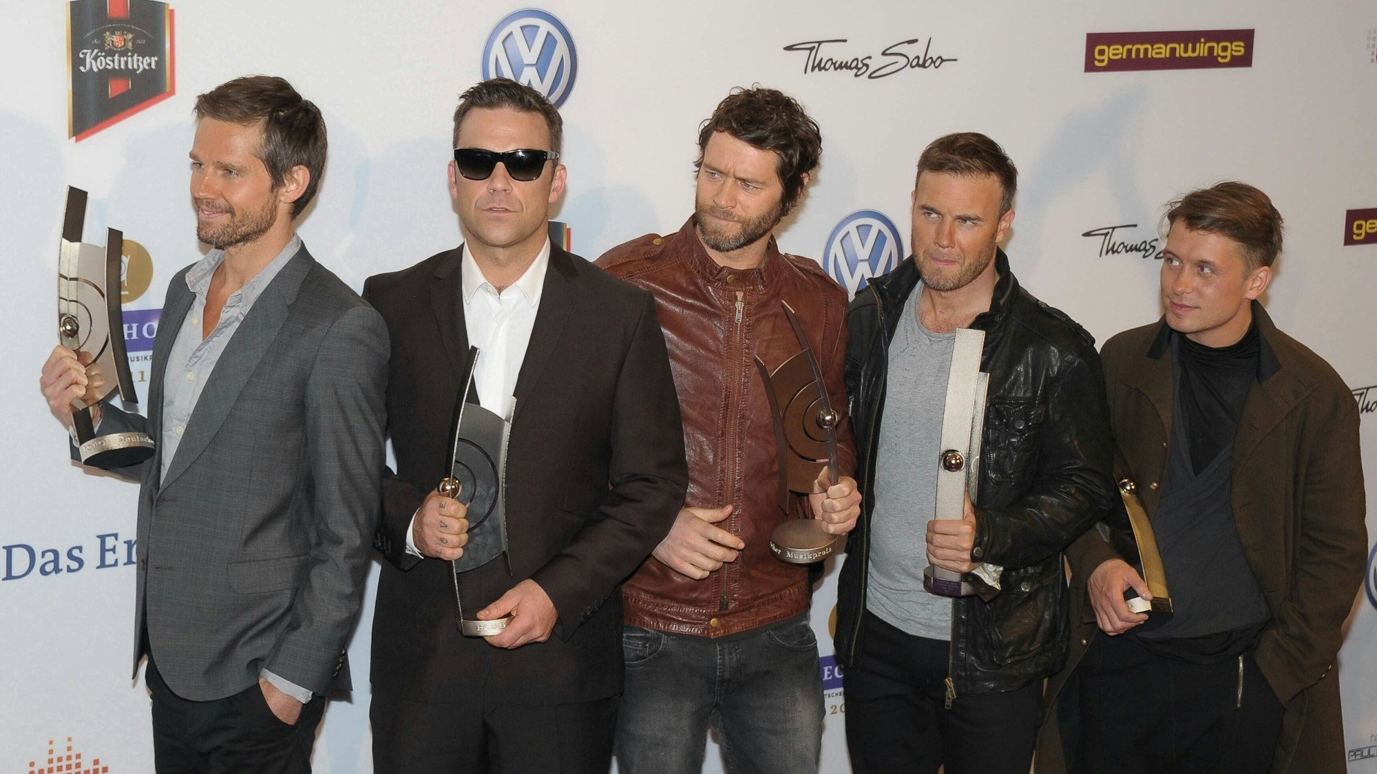 Take That gemeinsam mit Robbie Williams beim Photocall anlässlich des ECHO – Deutscher Musikpreis 2011 in Berlin.