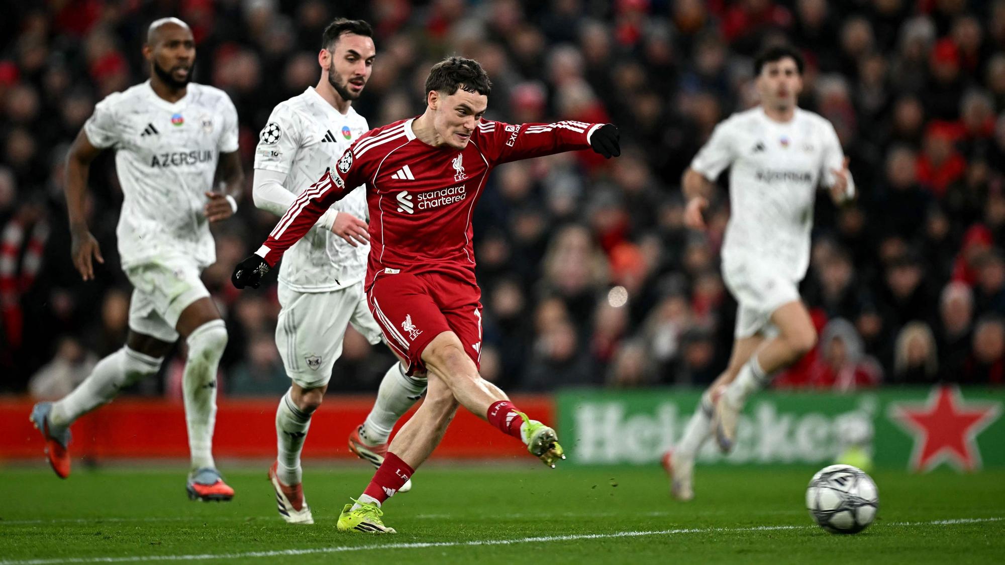 TOPSHOT - Liverpool's German midfielder #07 Florian Wirtz scores the team's second goal during the UEFA Champions League football match between Liverpool and Qarabag at Anfield in Liverpool, north west England on January 28, 2026. (Photo by Paul ELLIS / AFP)