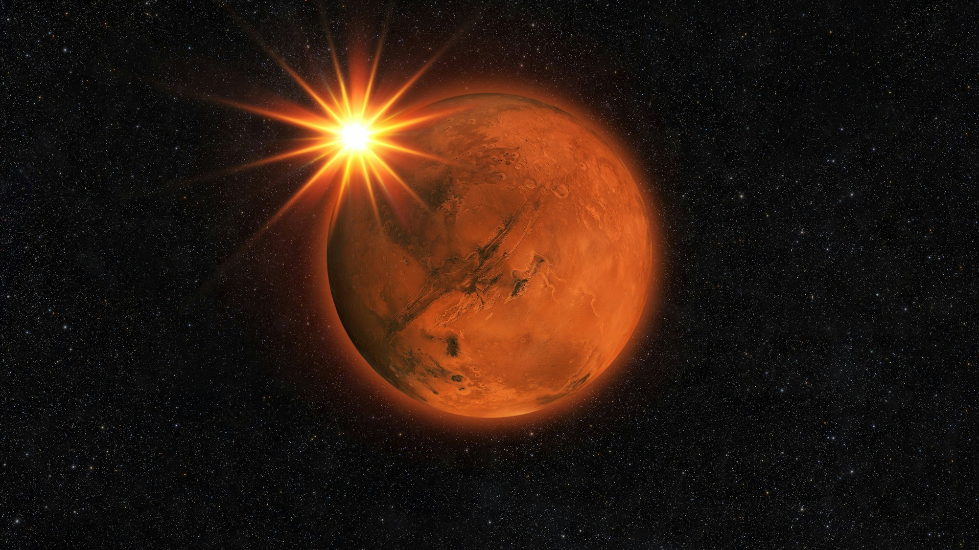 Die Sonne schaut hinter dem Mars hervor.