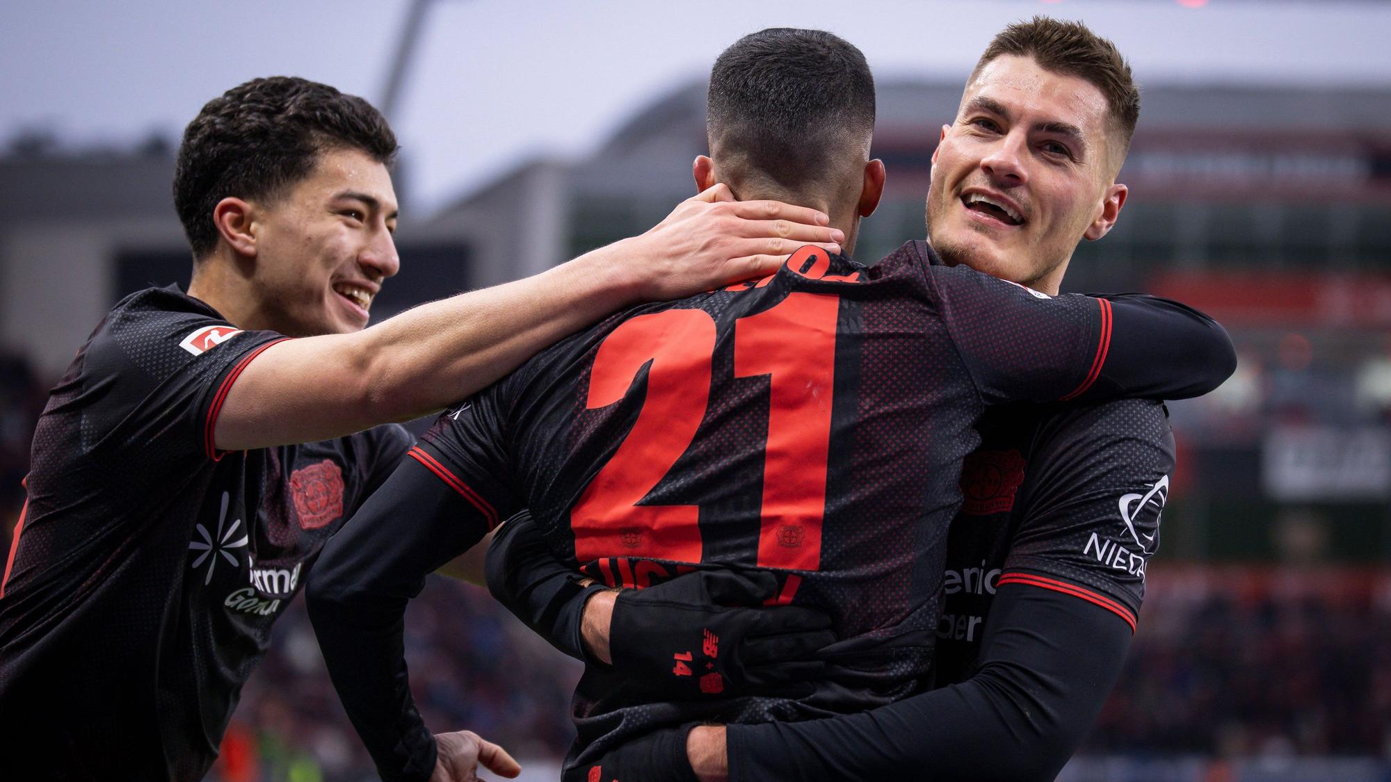 LEVERKUSEN, GERMANY - FEBRUARY 14: Patrik Schick Bayer 04 Leverkusen, 14 celebrates scoring his team s second goal with teammates during the Bundesliga match gameday 22 between Bayer 04 Leverkusen vs. FC St. Pauli at BayArena on February 14, 2026 in Leverkusen, Germany. Photo by Axel Kohring/Beautiful Sports Int. DFL REGULATIONS PROHIBIT ANY USE OF PHOTOGRAPHS AS IMAGE SEQUENCES AND/OR QUASI-VIDEO. Nordrhein-Westfalen Germany Copyright: xAxelxKohringx