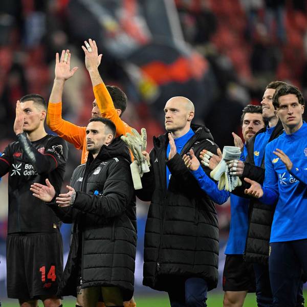 Leverkusen players applaud their fans after the UEFA Champions League play-off, second-Leg football match Bayer 04 Leverkusen vs Olympiakos in Leverkusen, western Germany, on February 24, 2026. (Photo by INA FASSBENDER / AFP)