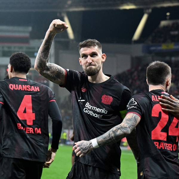 TOPSHOT - Bayer Leverkusen's German midfielder #08 Robert Andrich (2L) and teammates celebrate scoring their team's first goal during the UEFA Champions League, Last 16, first-leg football match Bayer 04 Leverkusen vs Arsenal in Leverkusen, western Germany, on March 11, 2026. (Photo by UWE KRAFT / AFP)