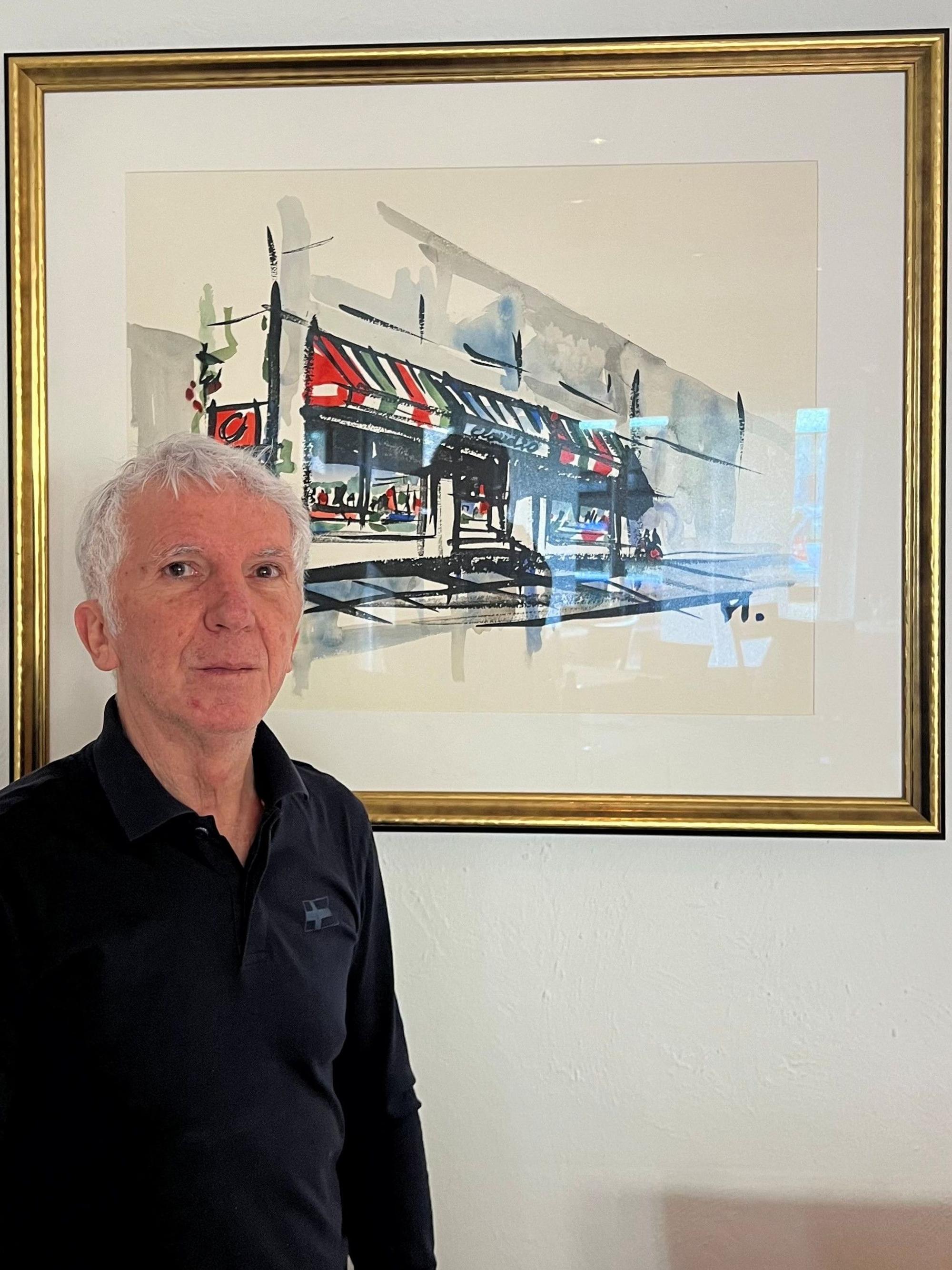Gastronom Claudio Pezzuto vor einem Bild in seinem Lokal, das der Vater von Guido Westerwelles Ehemann gemalt hat.