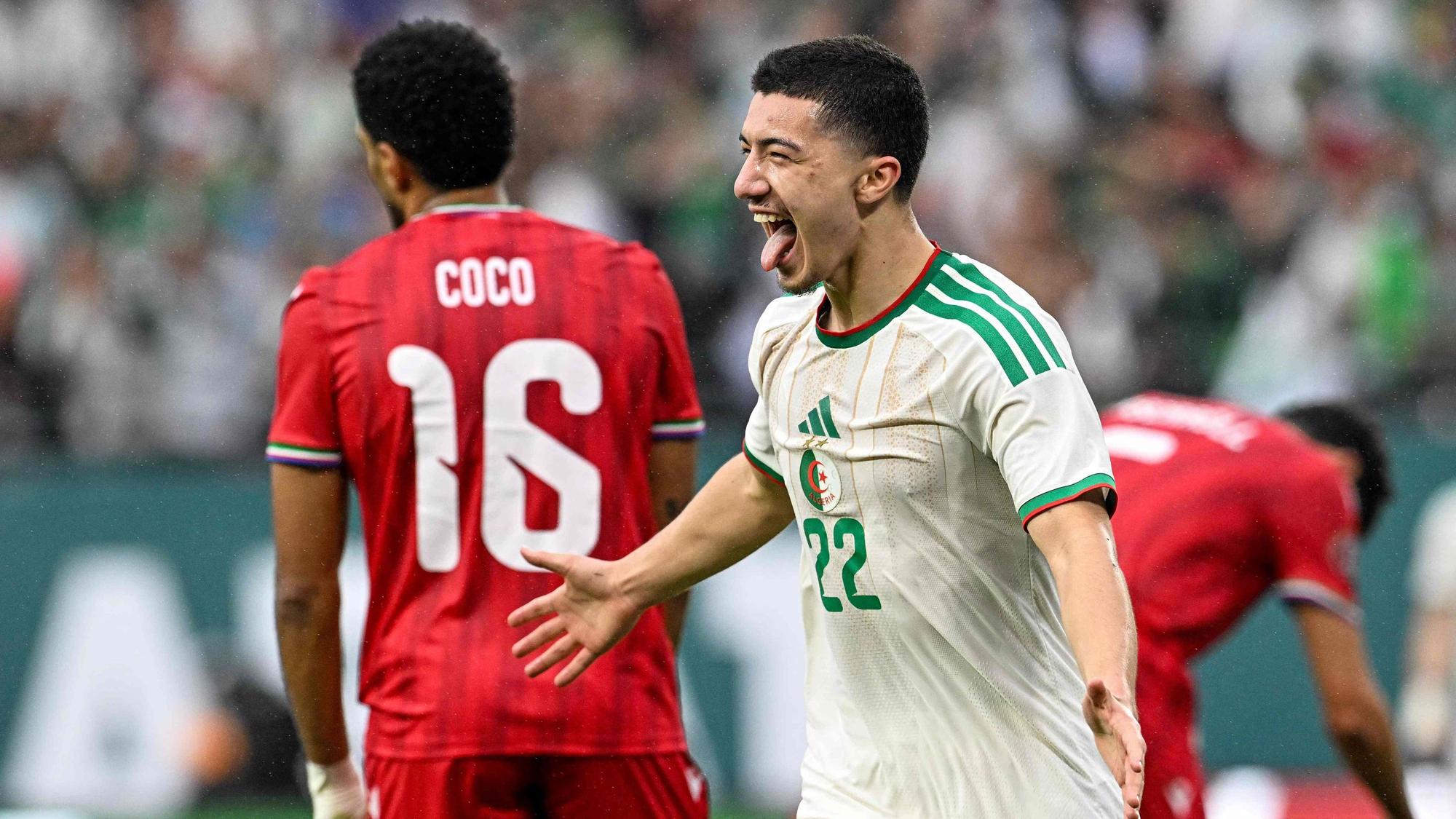 Algeria's midfielder #22 Ibrahim Maza celebrates scoring his team's third goal during the Africa Cup of Nations (CAN) Group E football match between Equatorial Guinea and Algeria at Moulay Hassan Stadium in Rabat on December 31, 2025. (Photo by Gabriel BOUYS / AFP)