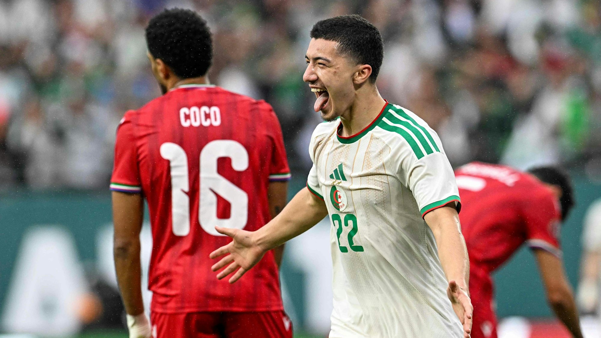 Algeria's midfielder #22 Ibrahim Maza celebrates scoring his team's third goal during the Africa Cup of Nations (CAN) Group E football match between Equatorial Guinea and Algeria at Moulay Hassan Stadium in Rabat on December 31, 2025. (Photo by Gabriel BOUYS / AFP)