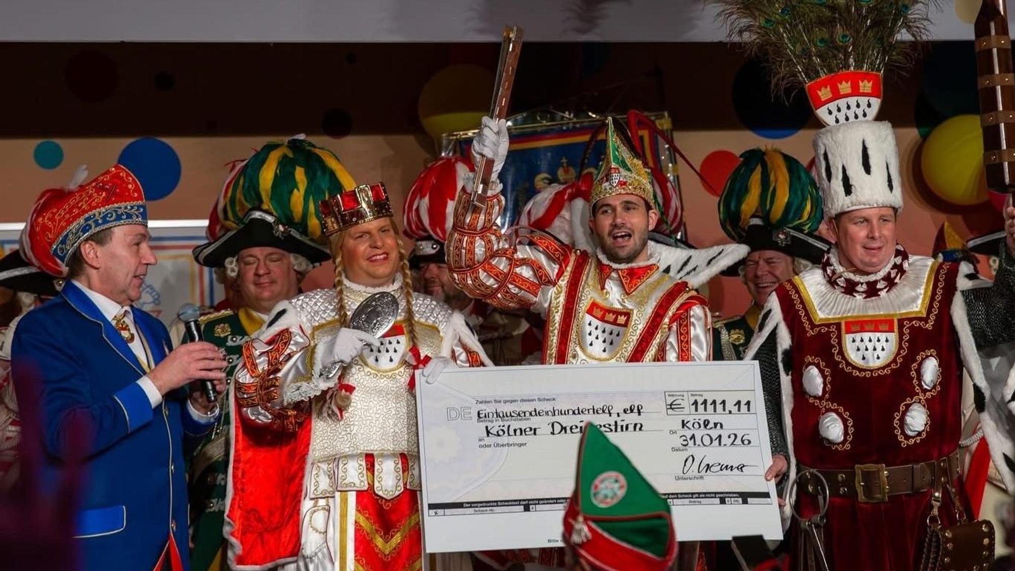 Oliver Cremer mit dem Kölner Dreigestirn.
