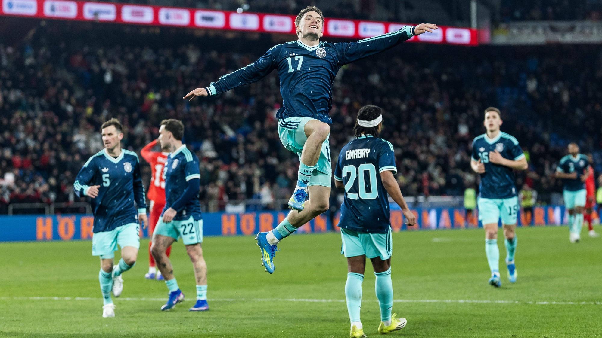 BASEL, SWITZERLAND - MARCH 27: Florian Wirtz Germany, 17 celebrates scoring the 3:4 goal during the friendly match between Switzerland vs. Germany at St. Jacobs-Park on March 27, 2026 in Basel, Switzerland. Switzerland Copyright: xSteffiexWunderlx