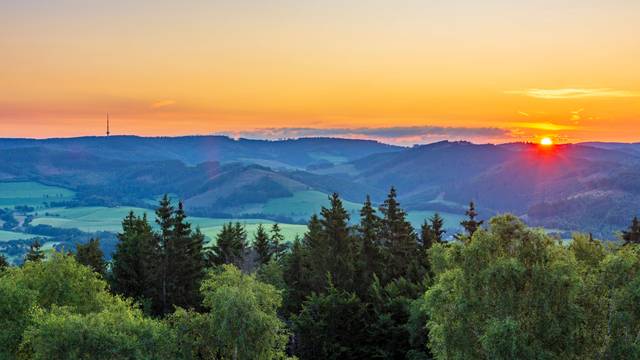 view from mountain Wilzenberg tower Wilzenbergturm in mountain range Rothaargebirge to Bödefeld telecommunications tower at sunrise Schmallenberg Sauerland Nordrhein-Westfalen, North Rhine Germany