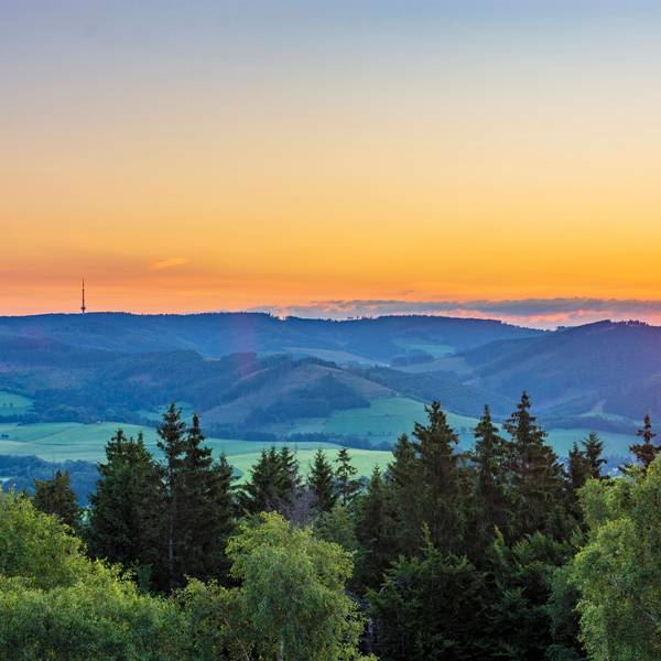 view from mountain Wilzenberg tower Wilzenbergturm in mountain range Rothaargebirge to Bödefeld telecommunications tower at sunrise Schmallenberg Sauerland Nordrhein-Westfalen, North Rhine Germany