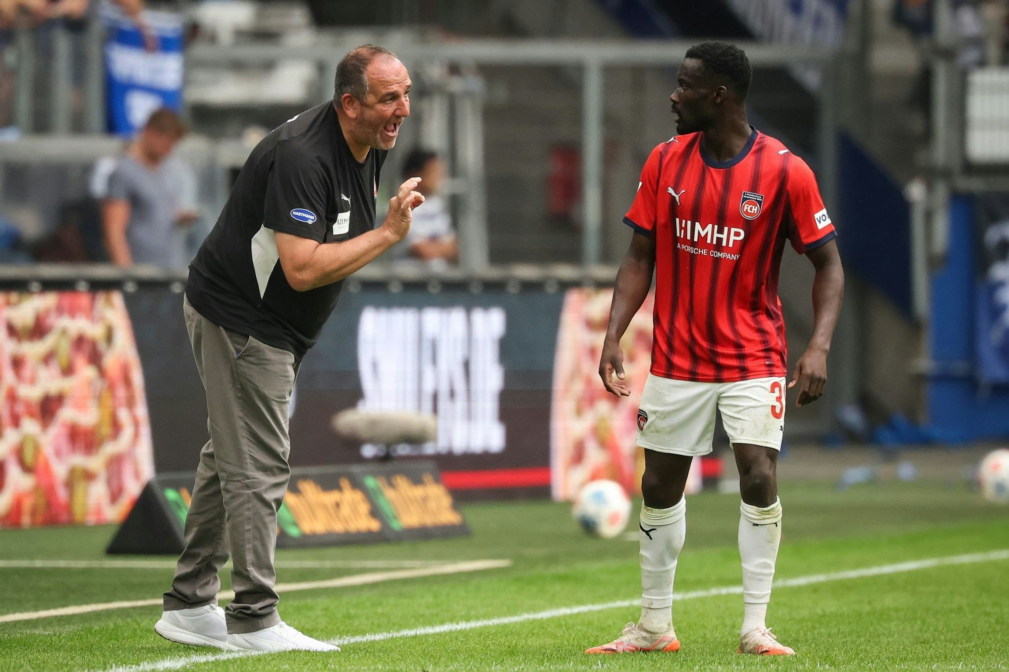 Frank Schmidt und Sirlord Conteh