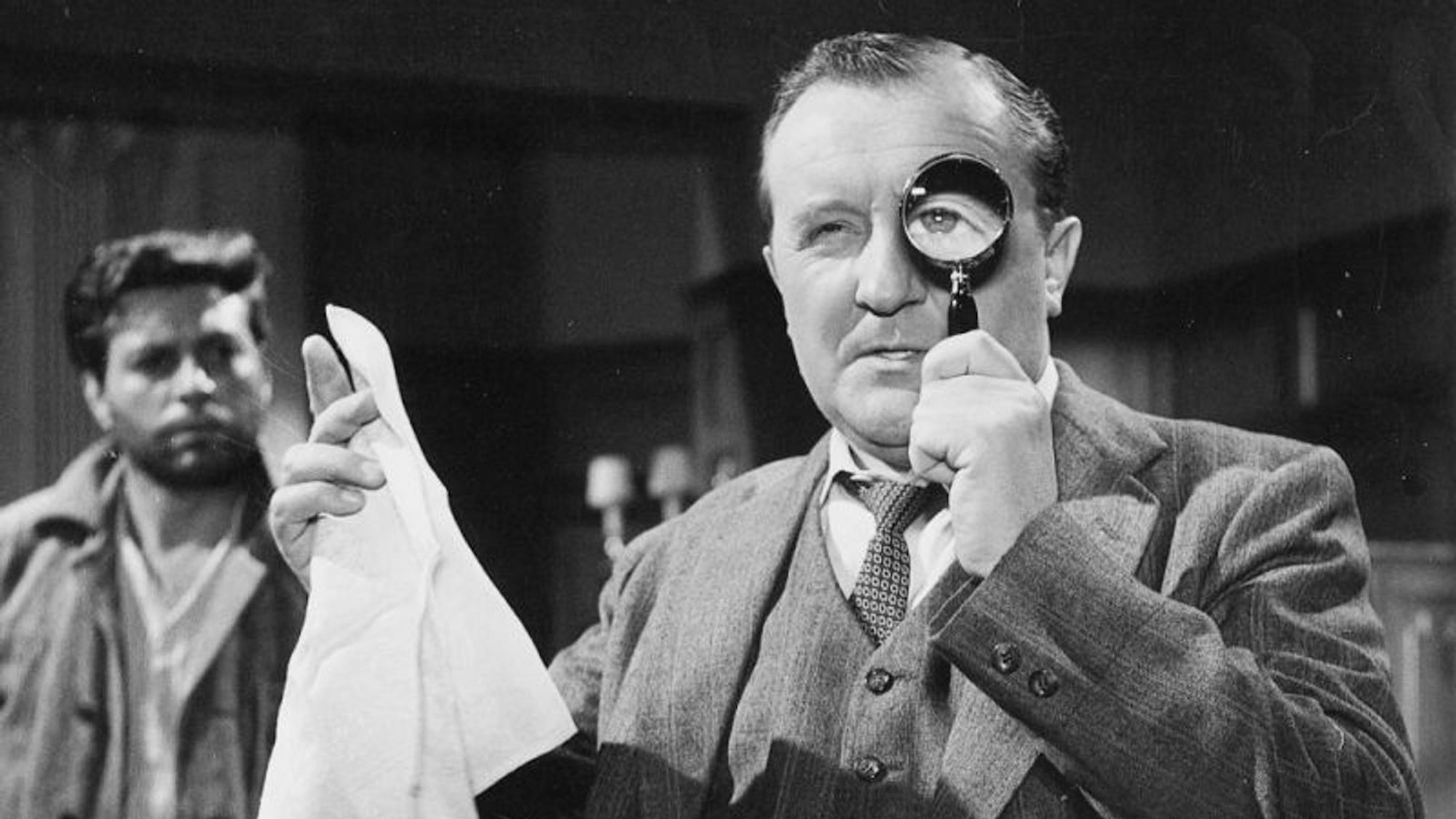 Siegfried Lowitz (Bild, rechts, aus „Der Frosch mit der Maske“) spielte in mehreren Edgar-Wallace-Filmen einen Inspektor. (Bild: Tobis Film)