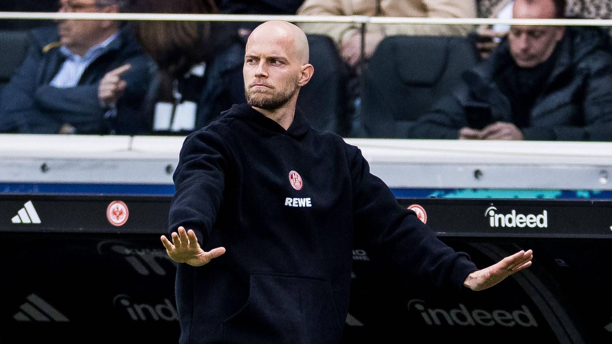 FRANKFURT, GERMANY - APRIL 5: Rene Wagner Head Coach 1. FC Koeln gestures during the Bundesliga match between Eintracht Frankfurt vs. 1. FC Koeln at Deutsche Bank Park on matchday 28 of the 1. Bundesliga on April 5, 2026 in Frankfurt, Germany. DFL REGULATIONS PROHIBIT ANY USE OF PHOTOGRAPHS AS IMAGE SEQUENCES AND/OR QUASI-VIDEO. Hessen Germany Copyright: xSteffiexWunderlx