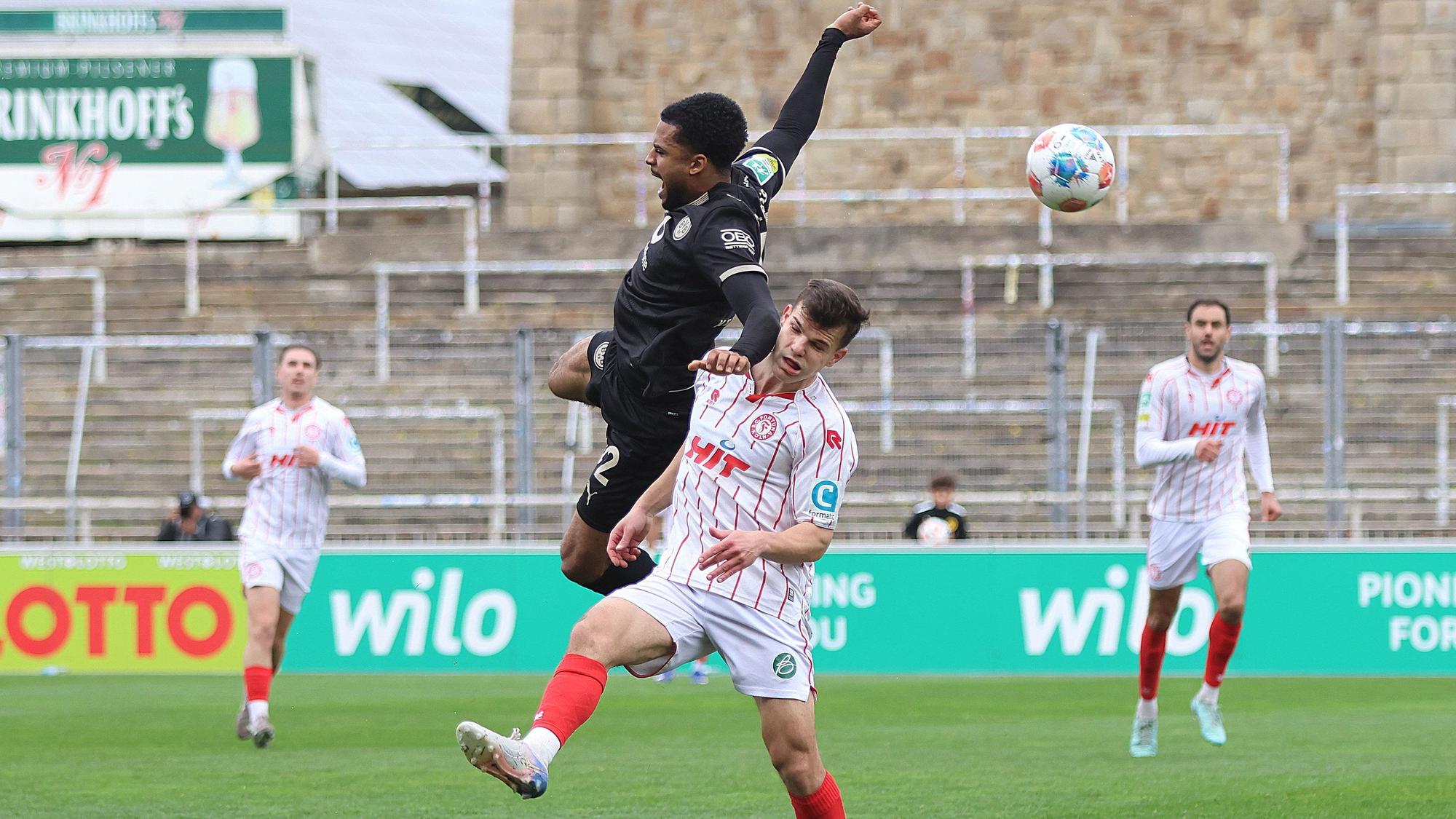 Regionalliga West: Borussia Dortmund U23 - SC Fortuna Koeln ** NUR FÜR REDAKTIONELLE ZWECKE ** EDITORIAL USE ONLY **Fussball Regionalliga West 28.Spieltag Samstag 04.04.2026 Ort: Stadion Rote Erde Dortmund Borussia Dortmund II - SC Fortuna Koeln Im Bild von links Almugera Kabar (BVB U23) und Nico Thier (SC Fortuna Koeln) Deutschland Dortmund Copyright: StefanxRittershaus *** Regionalliga West Borussia Dortmund U23 SC Fortuna Koeln FOR EDITORIAL PURPOSES ONLY p Soccer Regionalliga West 28 Matchday Saturday 04 04 2026 Location Stadion Rote Erde Dortmund Borussia Dortmund II SC Fortuna Koeln Pictured from left Almugera Kabar BVB U23 and Nico Thier SC Fortuna Koeln Germany Dortmund Copyright StefanxRittershaus Copyright: StefanxRittershaus doc859vw5yah1xt4nv21u95 ,EDITORIAL USE ONLY